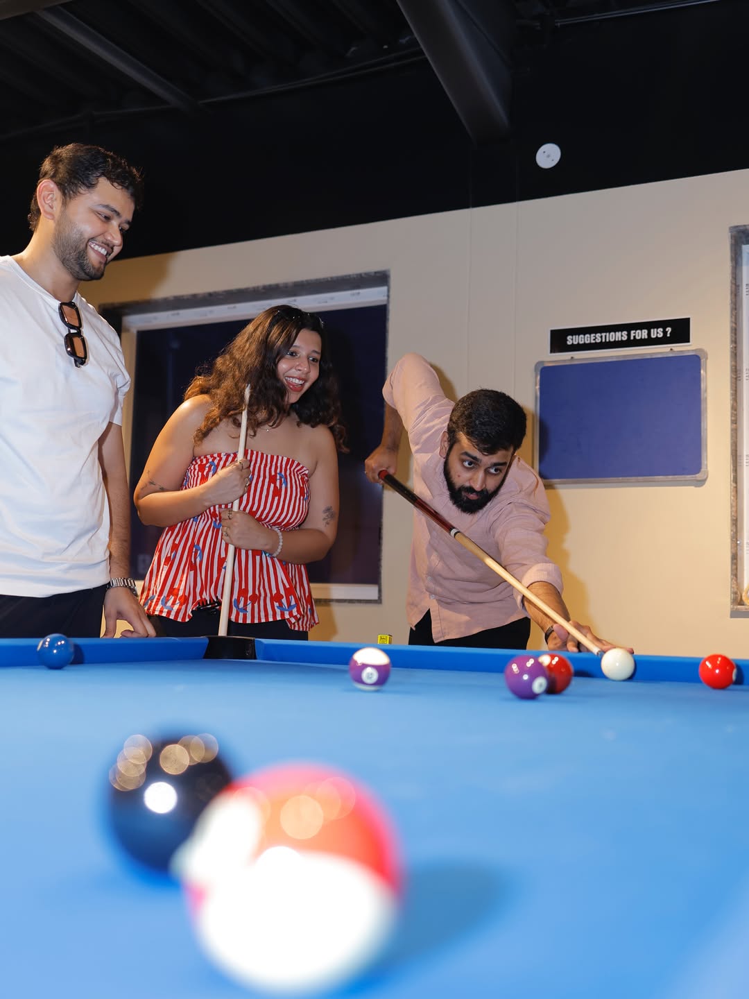 Pool Table players at POOL TABLE
